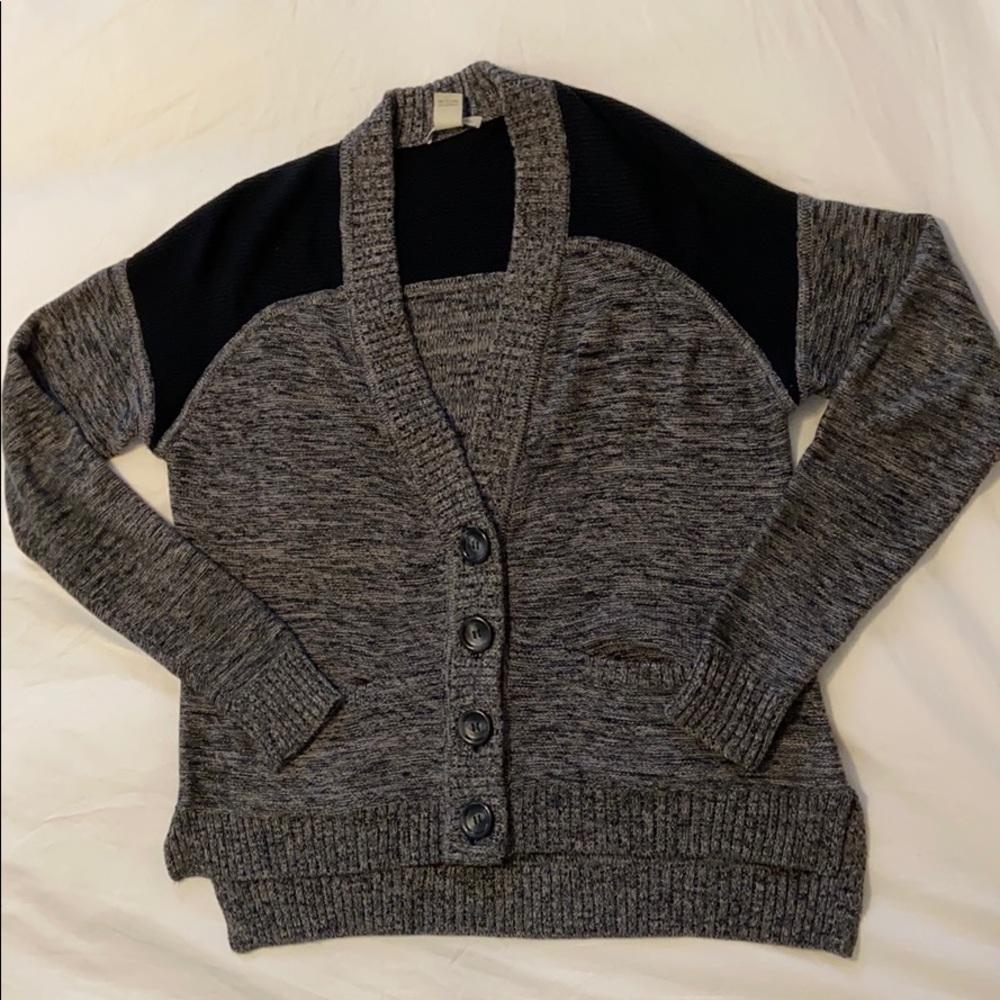 Knit sweater with large buttons